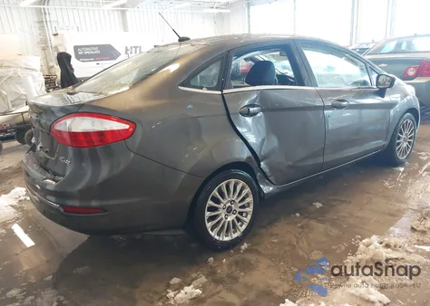 2015 Ford Fiesta Titanium from USA, damaged, VIN 3FADP4CJ2FM129362